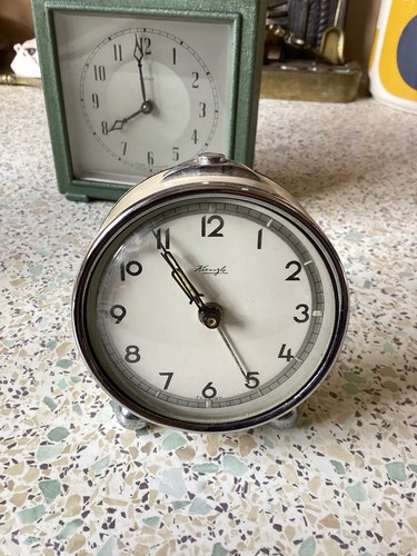 Wind alarm travel clock - up,